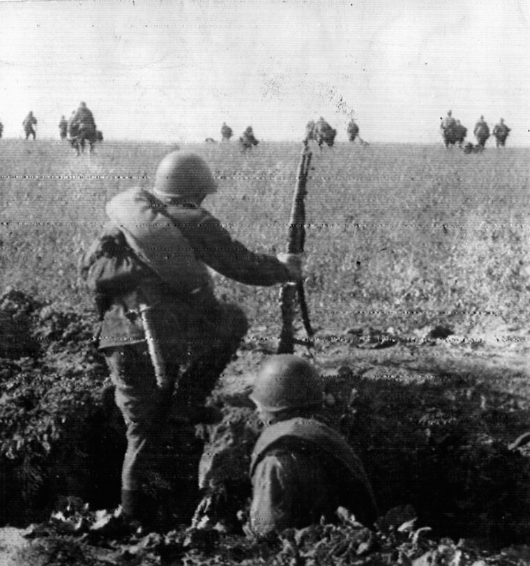 Exposing themselves to direct fire from German machine guns, Red Army soldiers step up to attack.
