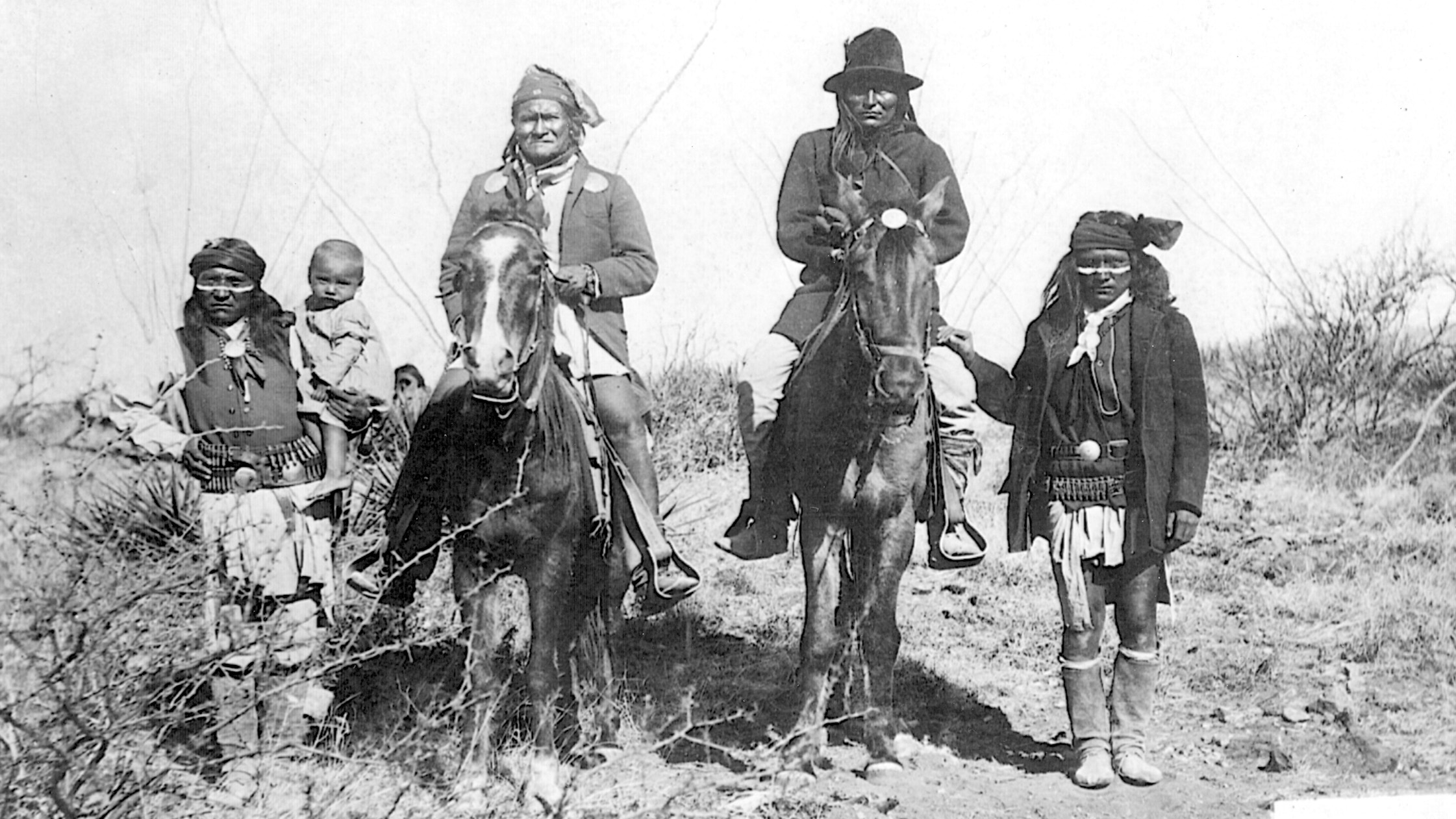 Geronimo and Naiche (with dark hat) , both mounted on ponies, pose with other tribe members in the 1880s. Naiche was the son of Cochise and the last chief of the free Chiricahua Apaches.