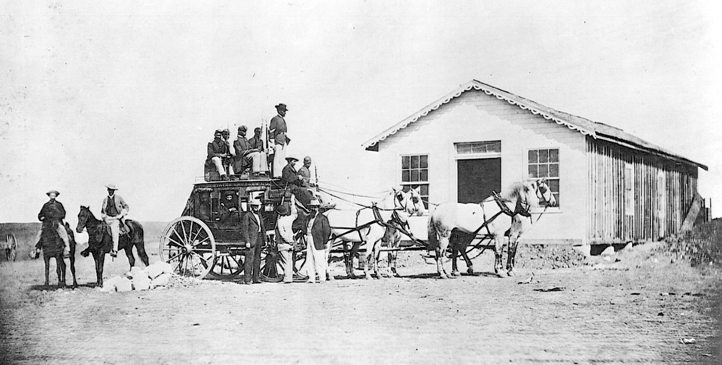 A stagecoach makes a stop at Fort Wallace in 1867.