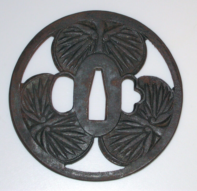 Echizen Kinai tsuba from the late 18th to 19th century with aoi motif.