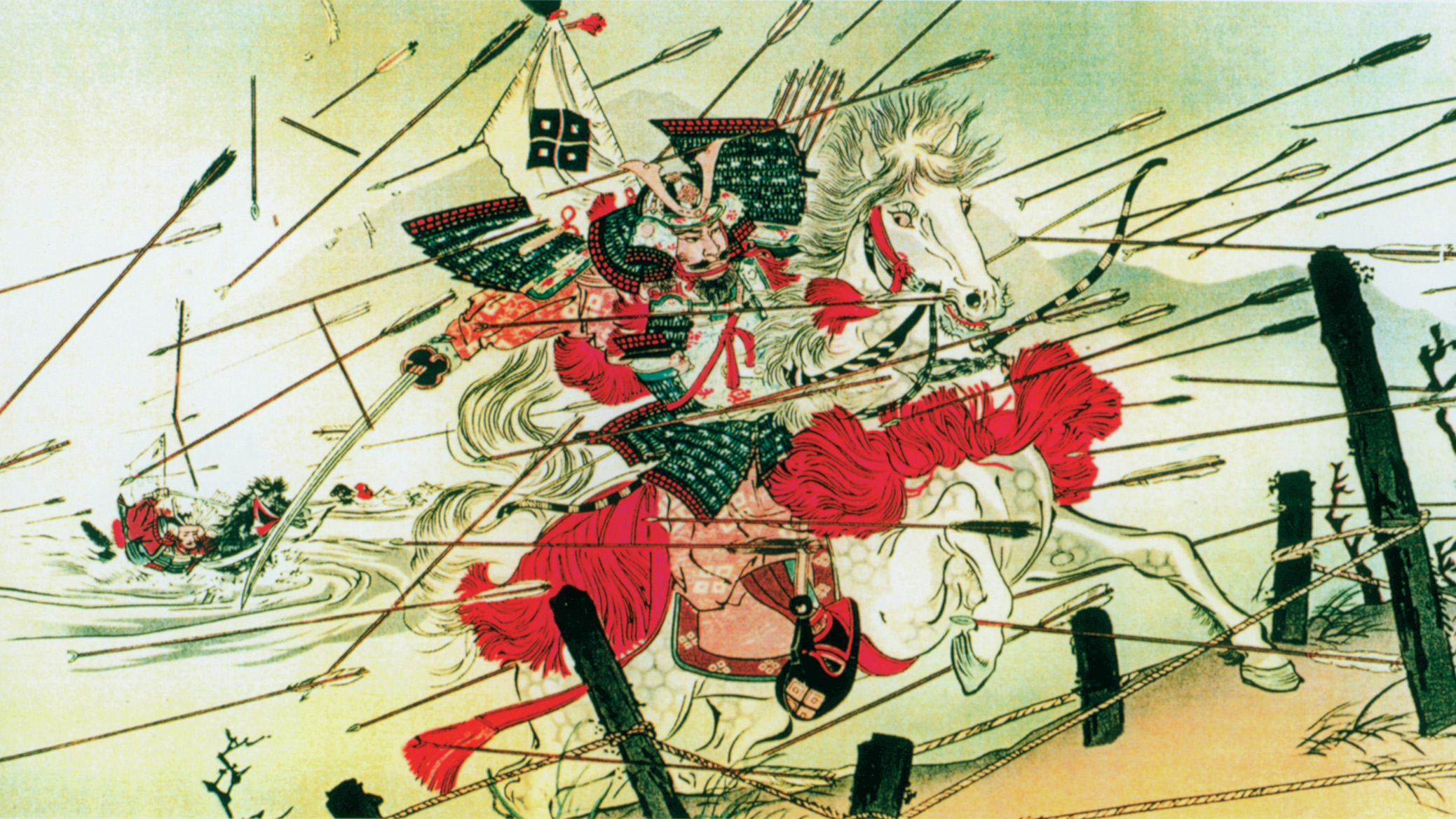 A samurai and his horse bound up the bank of a river to come to grips with the enemy. Precious sword in hand, the tsuba, or hand guard, is clearly visible. For hundreds of years great artistry was worked into the tsuba.