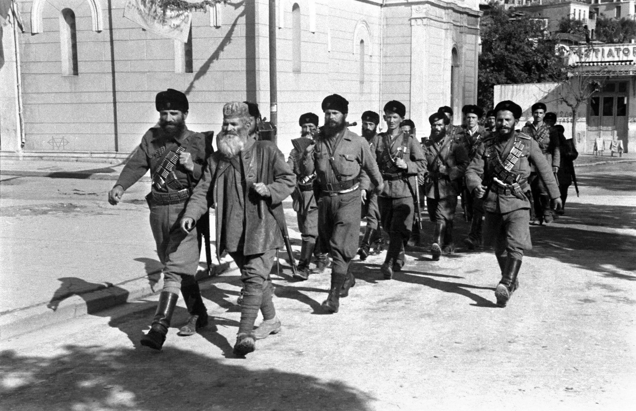 Greek communist partisans move into Lamia in central Greece after its liberation from the Germans on October 19, 1944.