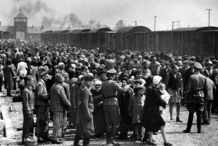 Prisoners being processed upon arrival at the Auschwitz-Birkenau death camp in Poland, May 1944, where a million Jews, including 70,000 from Greece, were gassed.