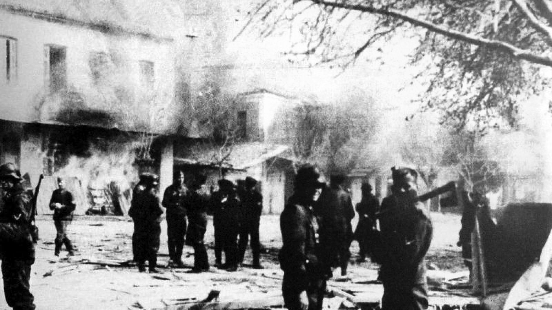 Many towns were wiped off the Greek map. Here, German soldiers put the small village of Distomo to the torch after murdering all of its 218 citizens, June 10, 1944.