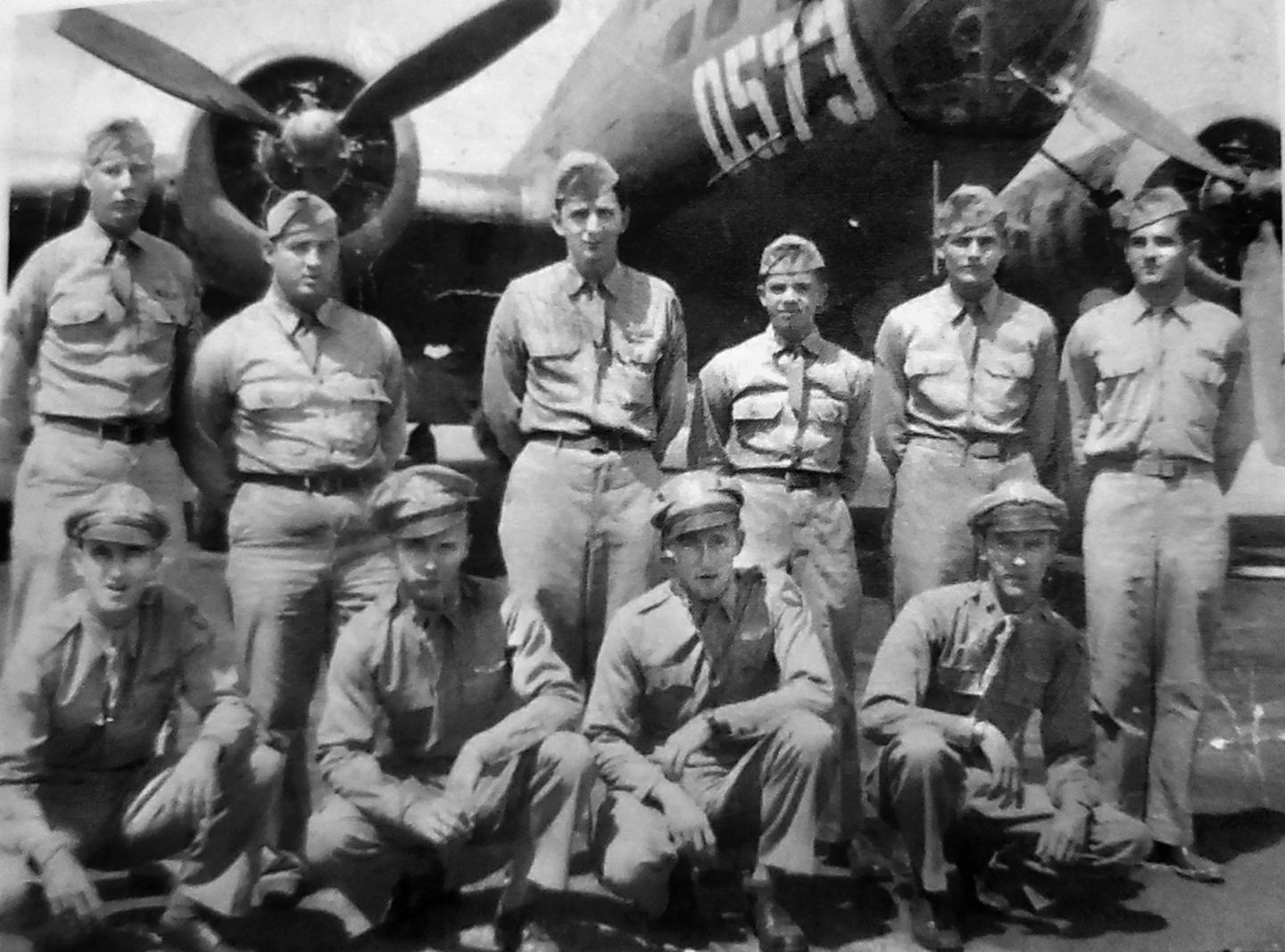 Crew of the B-17 “Kwitchurbitchin” (standing, from left): Clyde Dwight, Malcolm Vignes, Michael Joyce, Jack Taylor, Kenneth Snow, Kenneth Tucker. (Kneeling, from left): Louis Dunigan, James Garrison, Halsey Nisula, Donal McQuistion. 