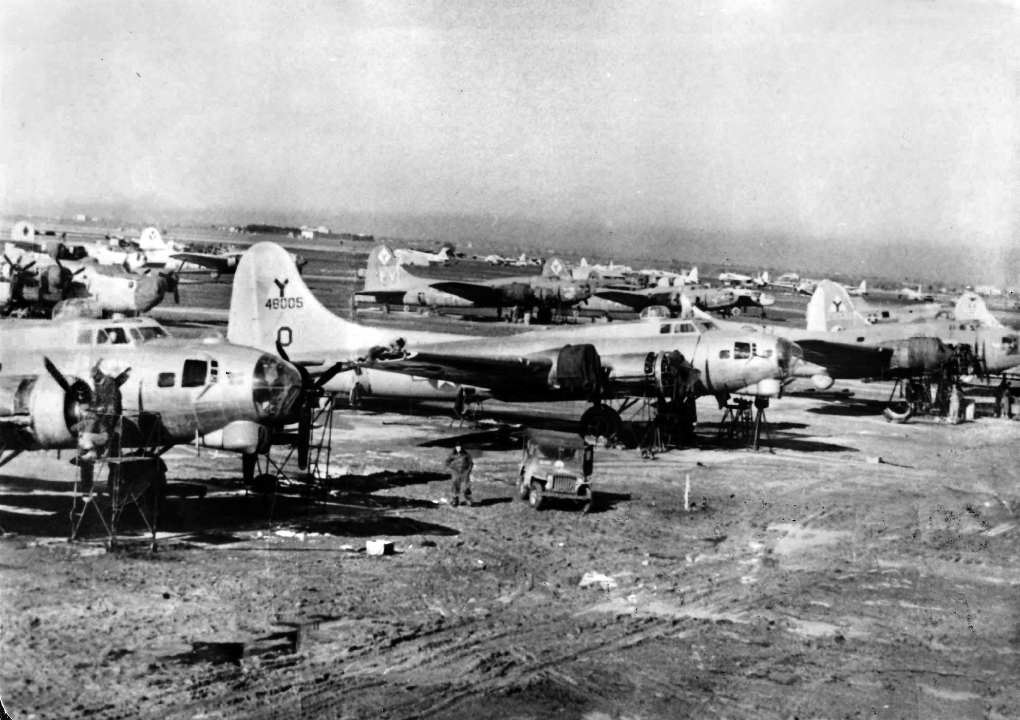 The 97th Bomb Group B-17s parked in the mud at Amendola Field in Foggia, Italy, where the living conditions were primitive and unpleasant for the crews but were heaven compared to their bombing missions.