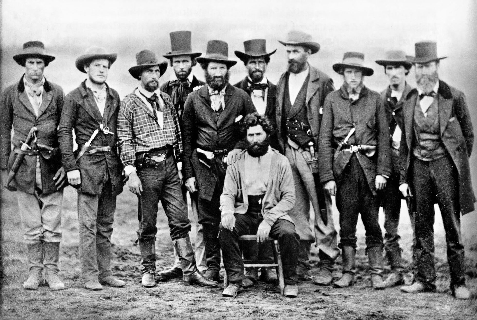 Armed “Free Staters” pose with abolitionist Dr. John Doy (seated) after they broke him out of jail in St. Joseph, Missouri, where he was serving five years for freeing 13 slaves and trying to take them north to Nebraska. 