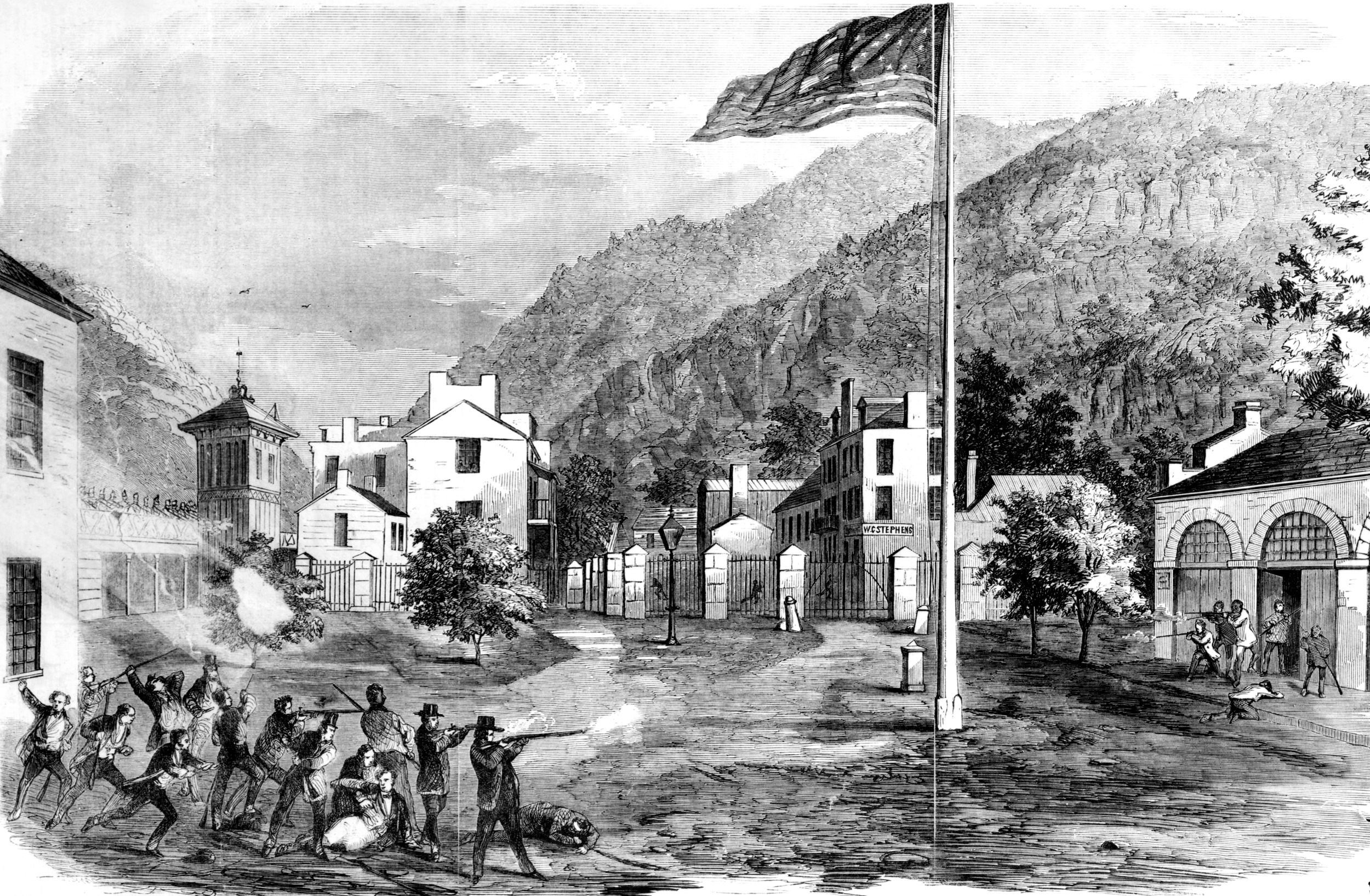 John Brown’s raiders clash with the militia on Monday, October 17, in this image from Frank Leslie's Illustrated Newspaper. Initially enthusiastic, the local militia fired on Brown’s men outside the Armory’s engine house (on right). The militia’s members were later described as being poorly armed, disorderly, cowardly, and, at times, roaring drunk by the time Col. Robert E. Lee and the U.S. Marines captured Brown on Tuesday, October 18.