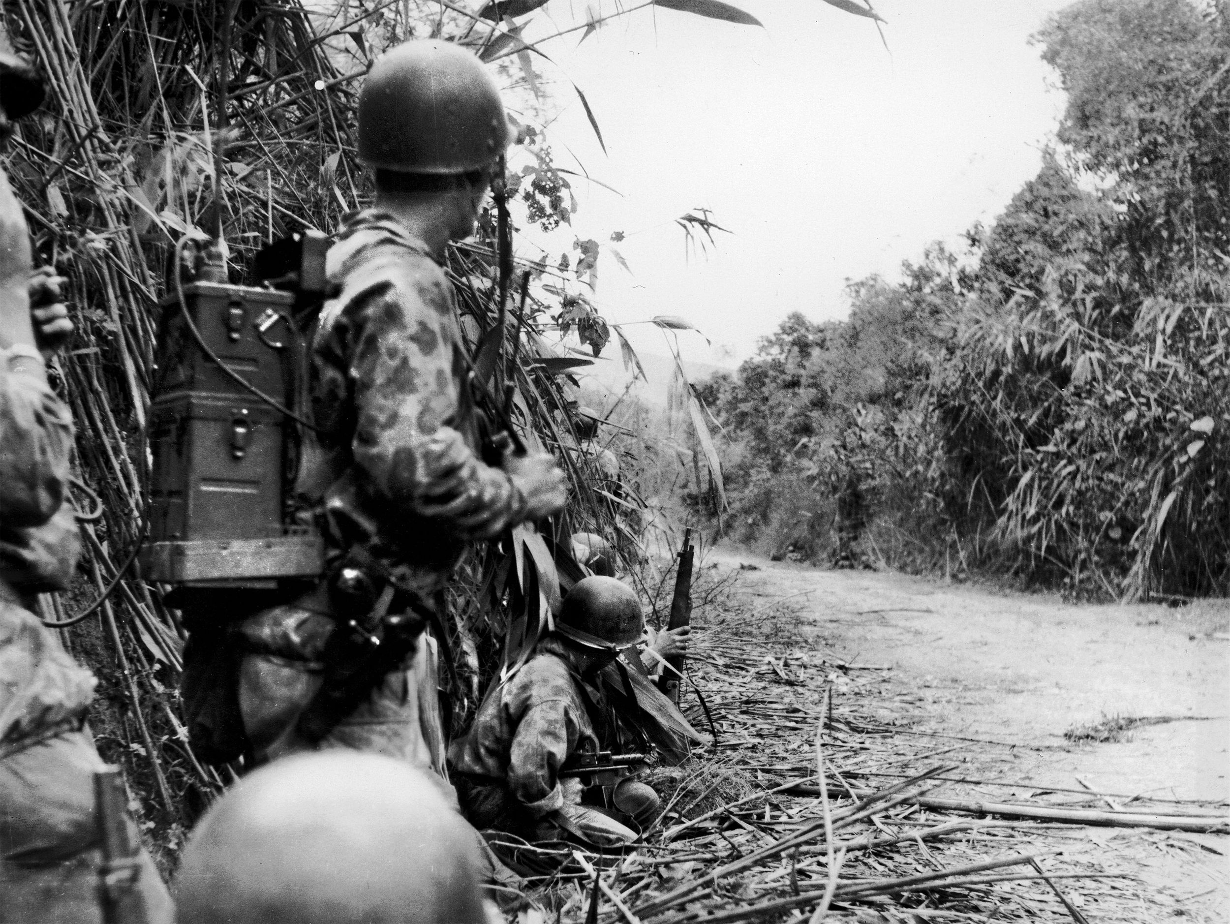 French paratroopers search for the source of Viet Minh gunfire. Forced to travel on the limited road system, the French were often ambushed by Viet Minh moving through the jungle.