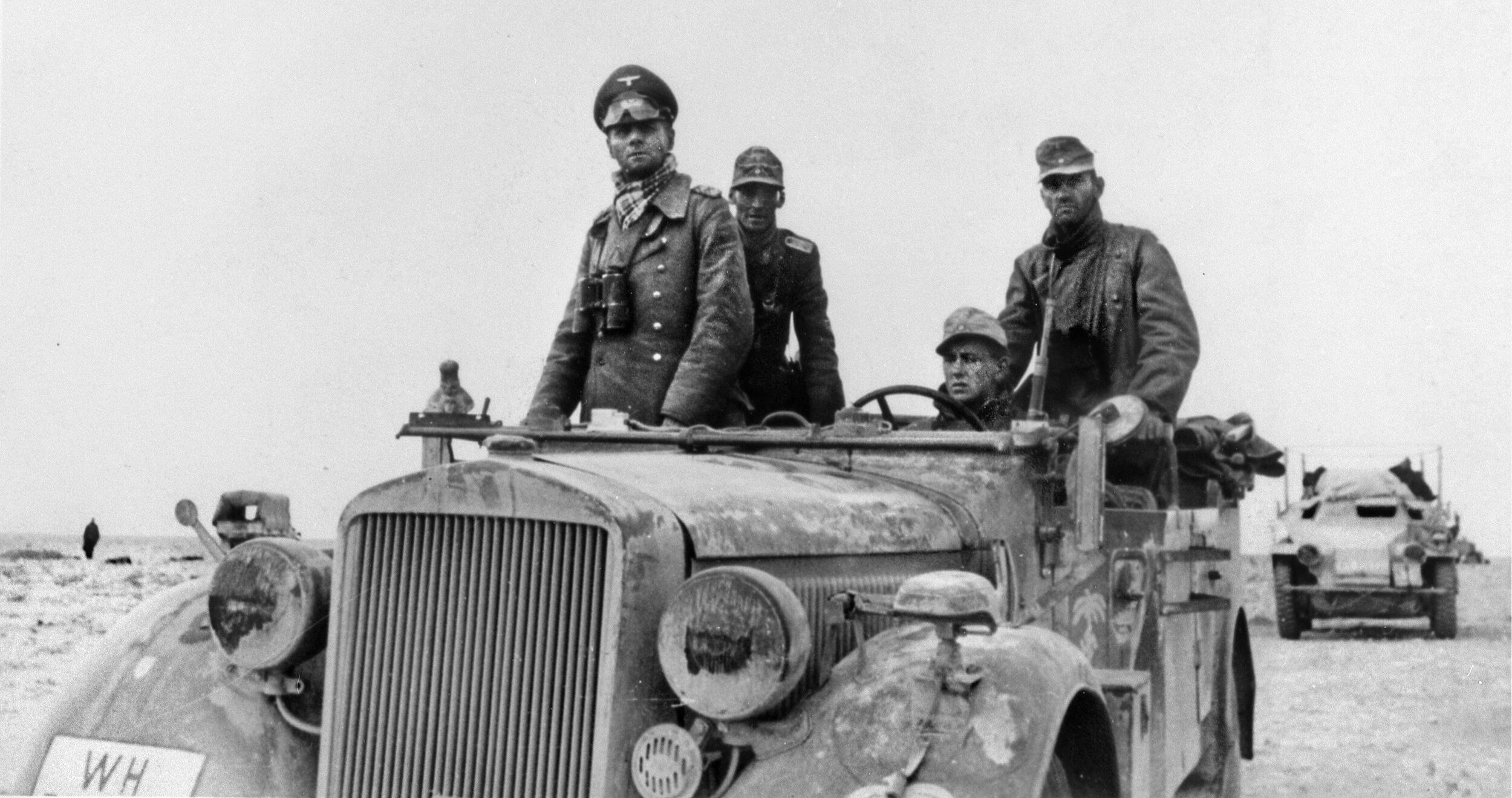 Lieutenant General Erwin Rommel in his staff car in North Africa in 1941. Arriving in Tripoli in February 1941, he was quickly on the advance, forcing British troops to retreat back into Eqypt.