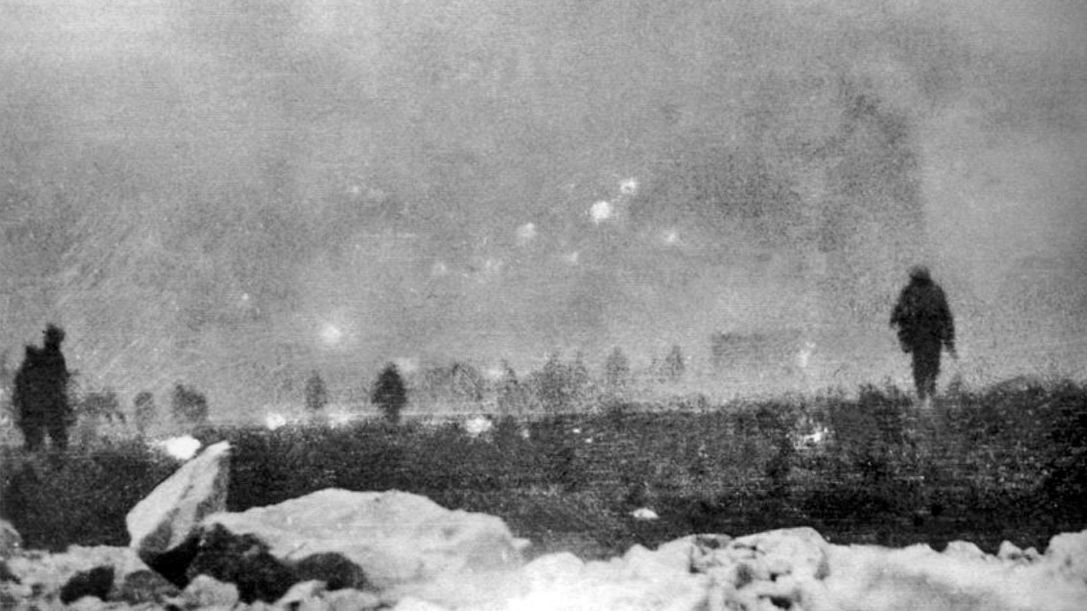 British troops advance to the attack through a cloud of poison gas as viewed from the trench which they have just left: a remarkable snapshot taken by a soldier of the London Rifle Brigade on the opening day of the Battle of Loos.