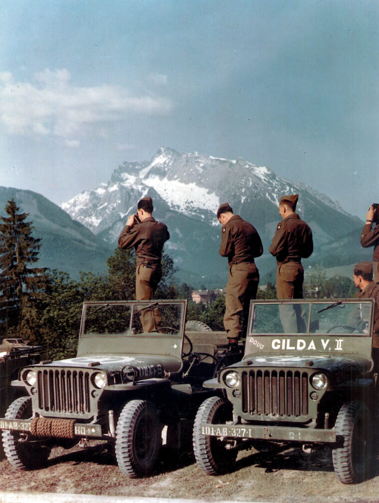 Shedding rifles for cameras, these glidermen of the 327th Glider Infantry Regiment snap photos of the Swiss Alps. Visiting GIs to the area became so numerous that General Maxwell Taylor, who commanded the Screaming Eagles, moved his headquarters to the nearby resort town of Badgastein, where he promptly kicked out the Japanese diplomats who were staying in the hotel. 