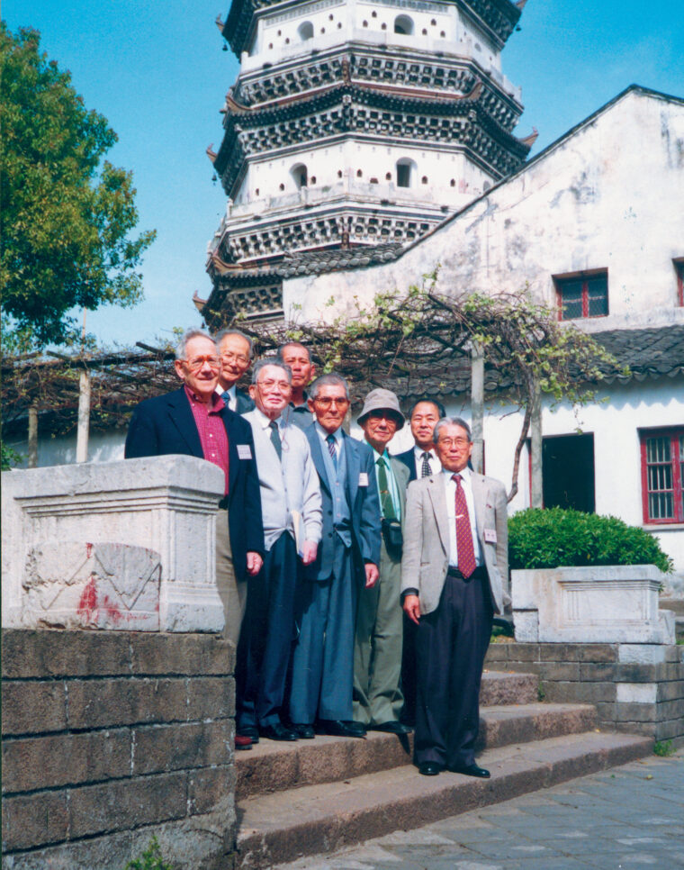 The author (far left) stands with members of the Japanese delegation at the famous Anqing pagoda, a symbol of the city for centuries.