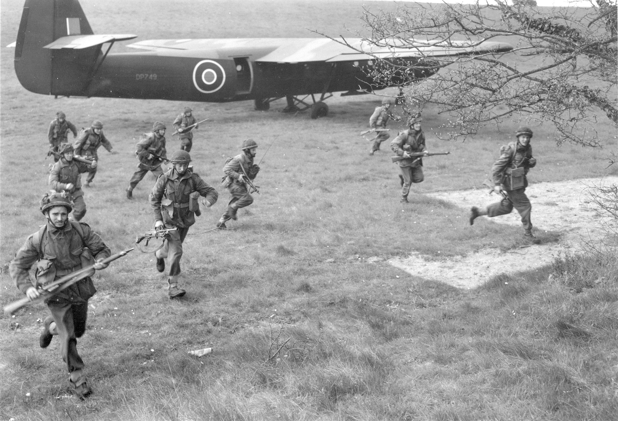 British paras hustle for cover after 
disembarking from their Horsa glider.