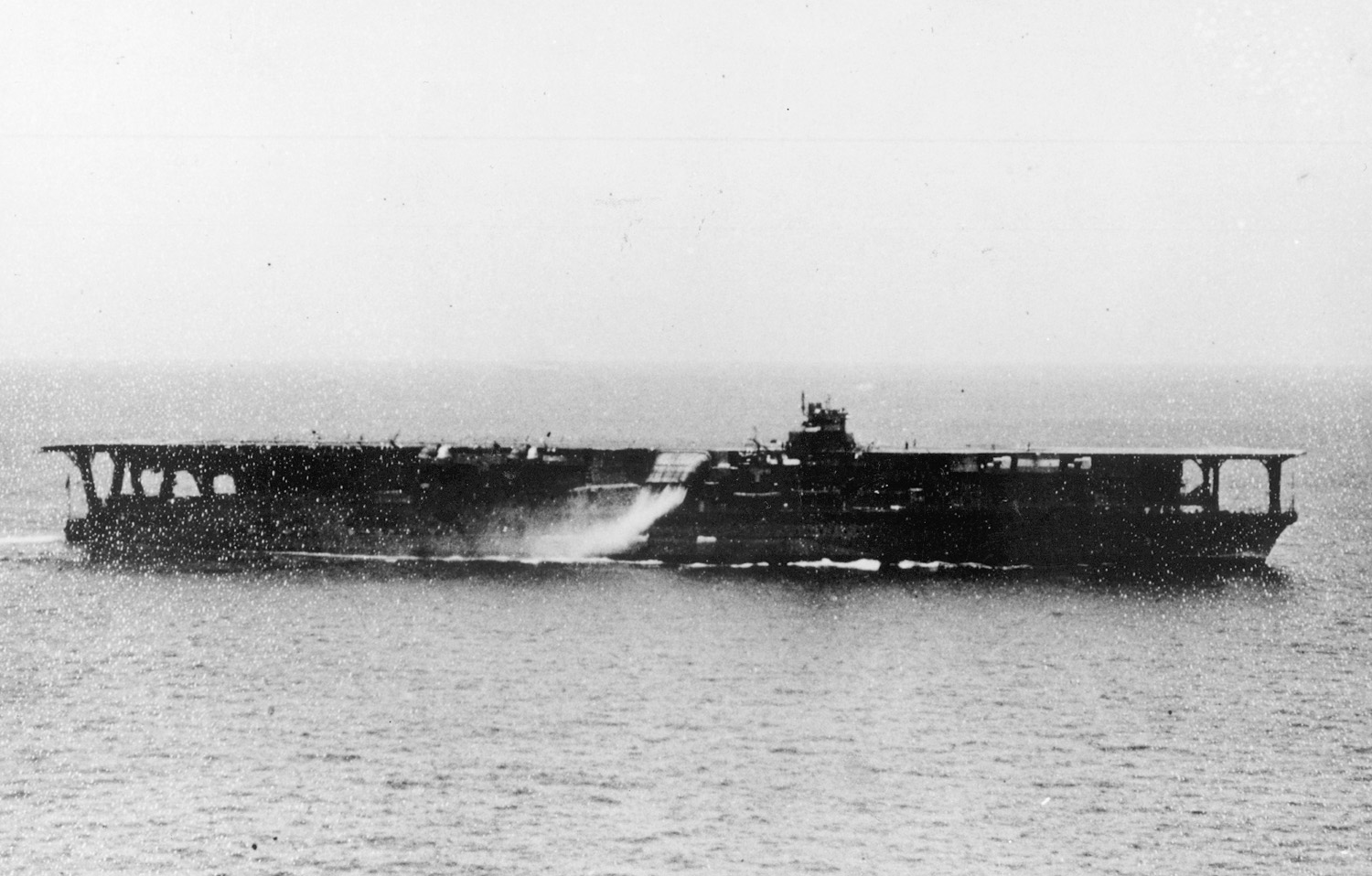 One of the carriers in the Japanese Fleet that attacked Pearl Harbor was Hiryu, here seen burning on June 5, 1942, during the Battle of Midway. 