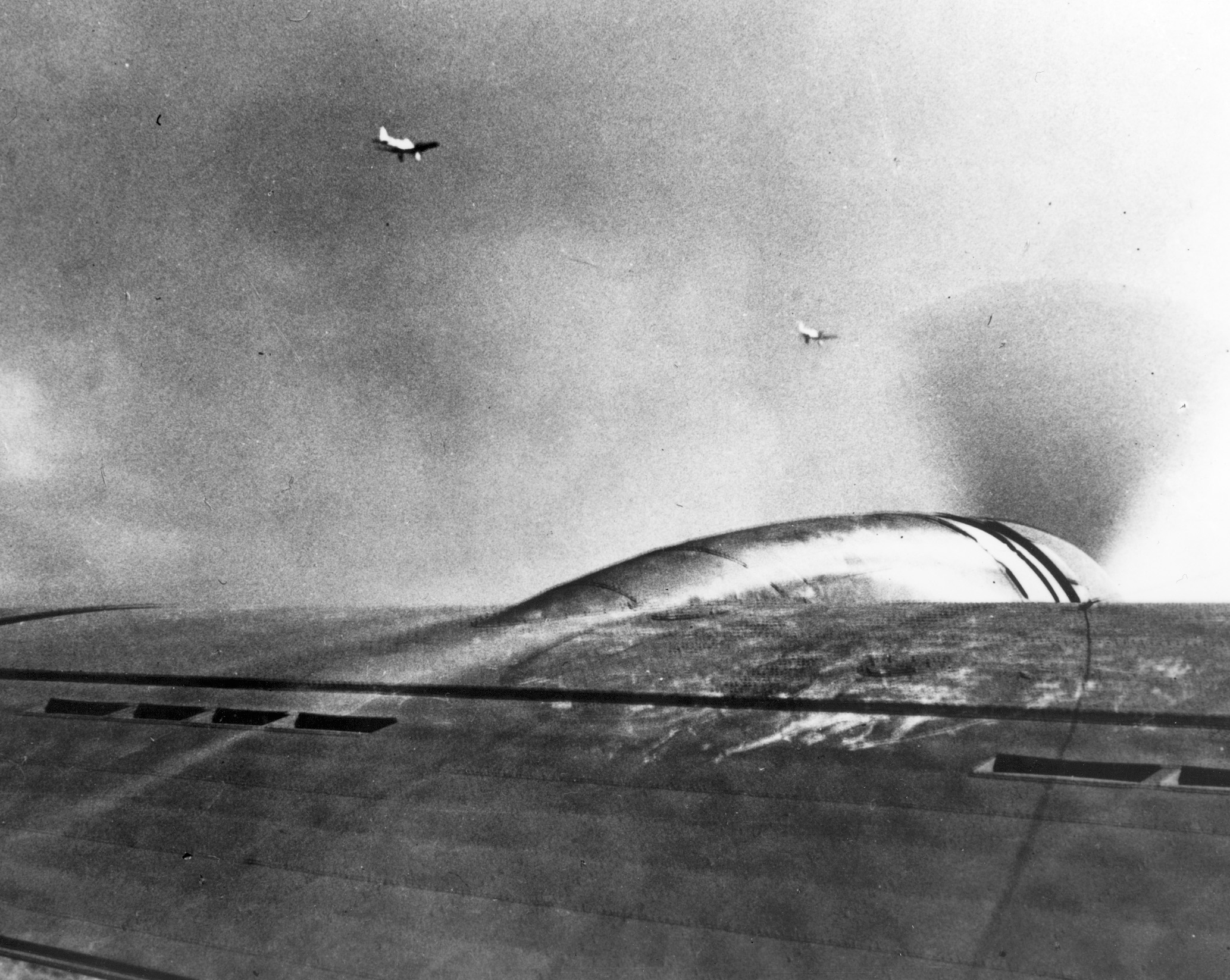 A pair of Aichi D3A Navy Type 99 dive-bombers was photographed from one of the B-17s arriving in Hawaii on the morning of December 7, 1941