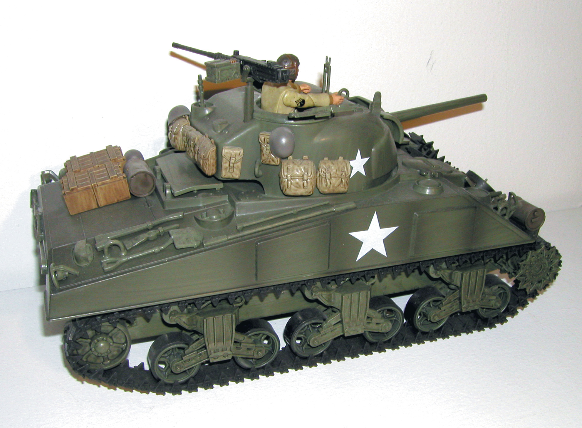 From the author’s collection, a 1/18 scale American Sherman tank made by 21st Century Toys.