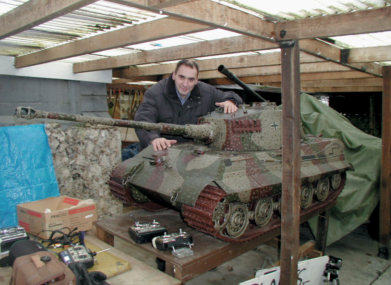 Russian model builder Alex Shlakhter poses with his 1/16 scale Panther tank.