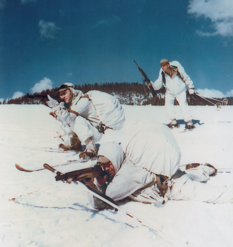 Troops of the 10th Mountain Division take aim during a postwar exercise.