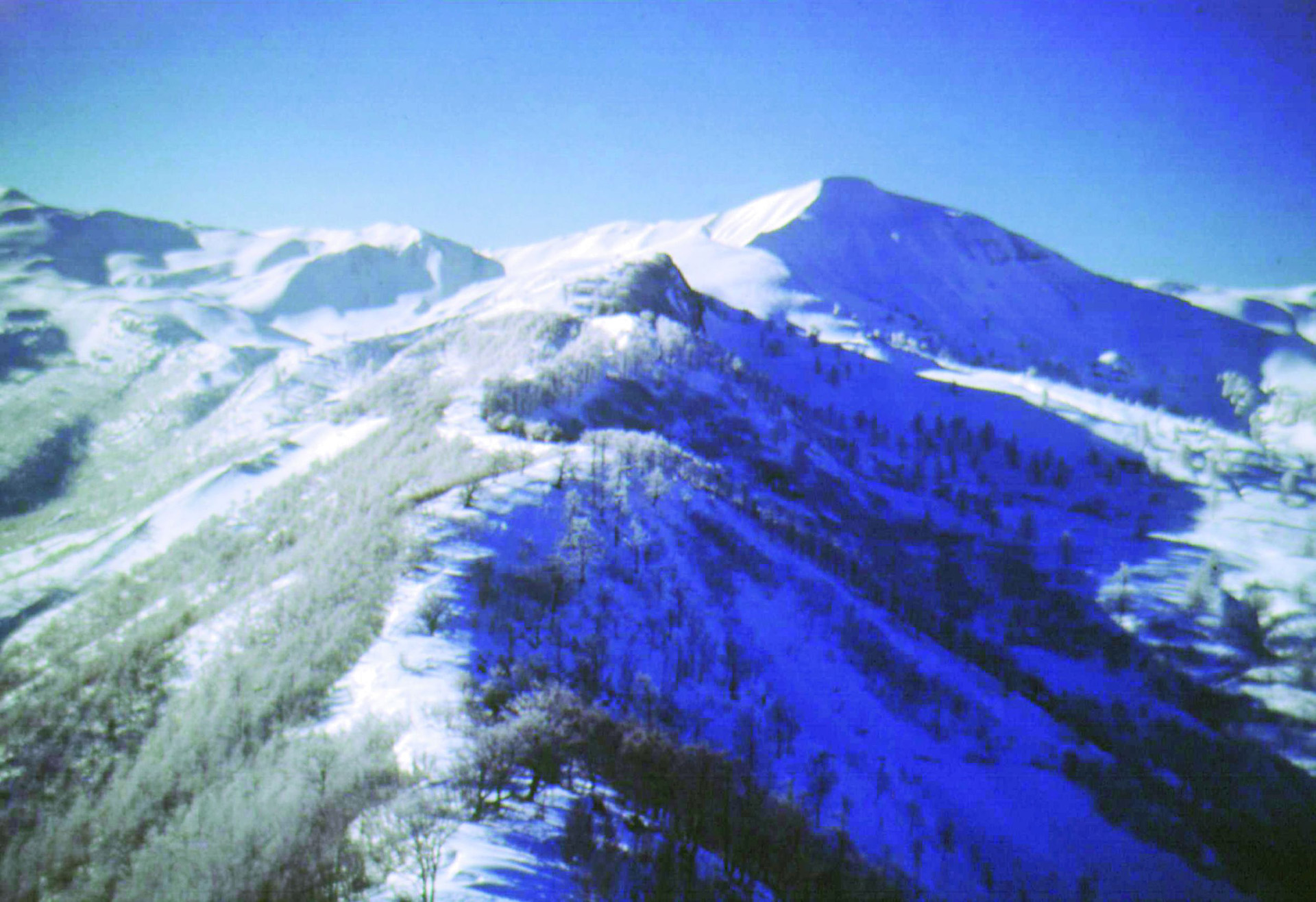 A view of snow-covered Riva Ridge reveals the formidable features of the 10th Mountain Division’s objective.