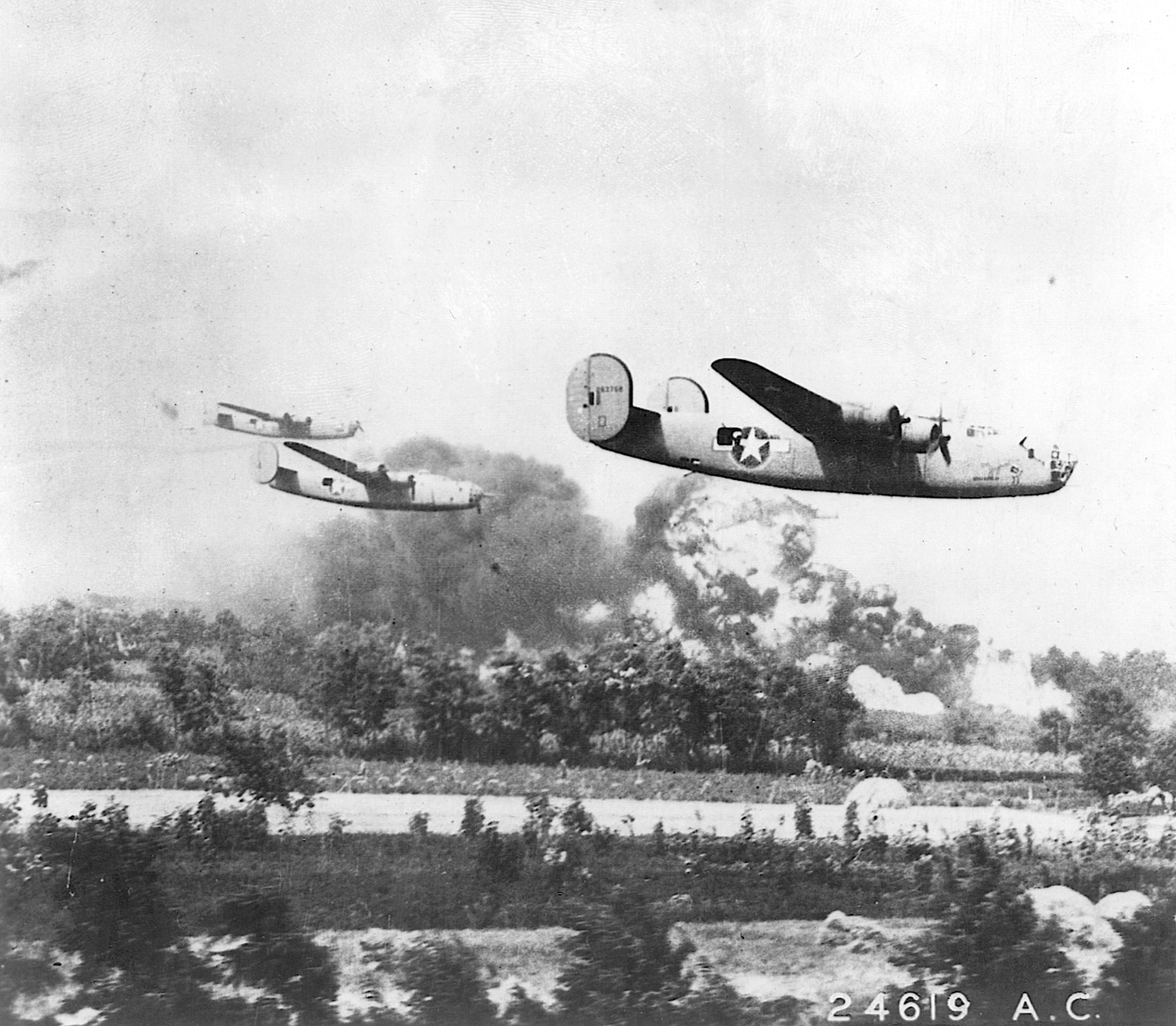 B-24s press home their low-level attacks during the epic raid against the oil refineries of Ploesti, Romania, on August 16, 1943. 