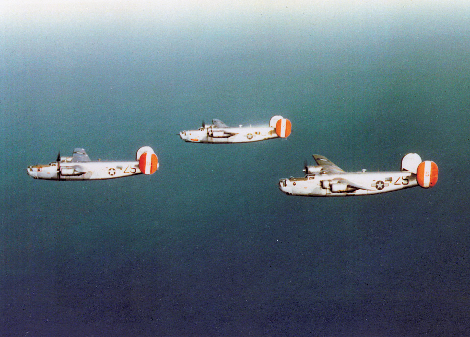 Eighth Air Force B-24s race across the North Sea en route to a bombing run in northern Germany.
