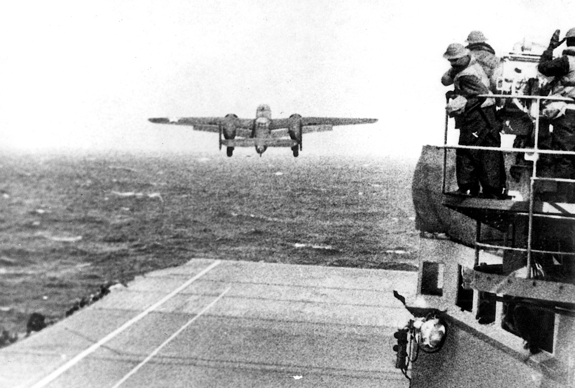 The second of Doolittle’s 16 B-25s lifts off from the pitching deck of the carrier Hornet en route to Tokyo. 