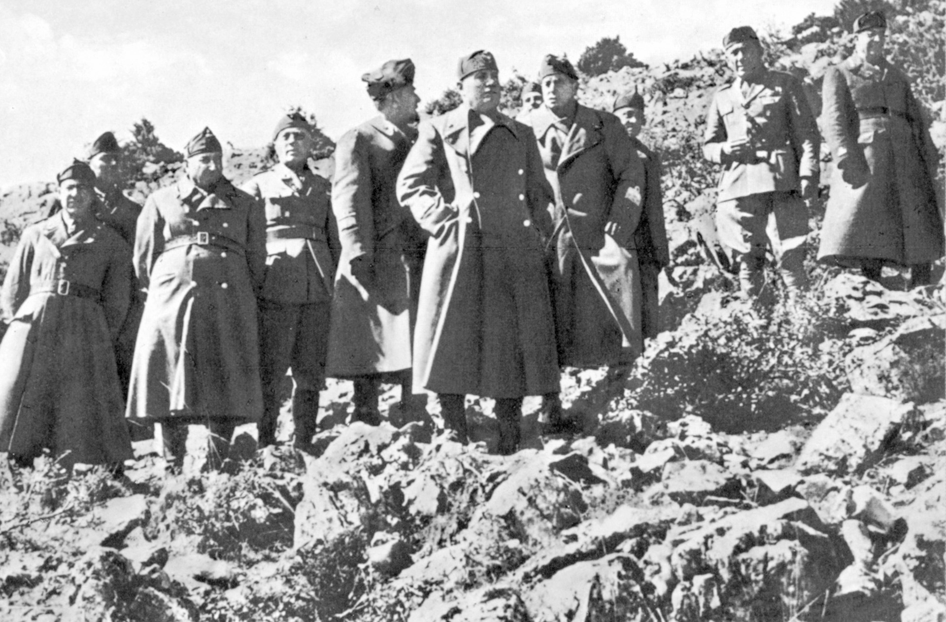 Mussolini visits the front line in Greece during March 1941. While his goal was to inspire the Italian troops, the results of the visit are questionable.