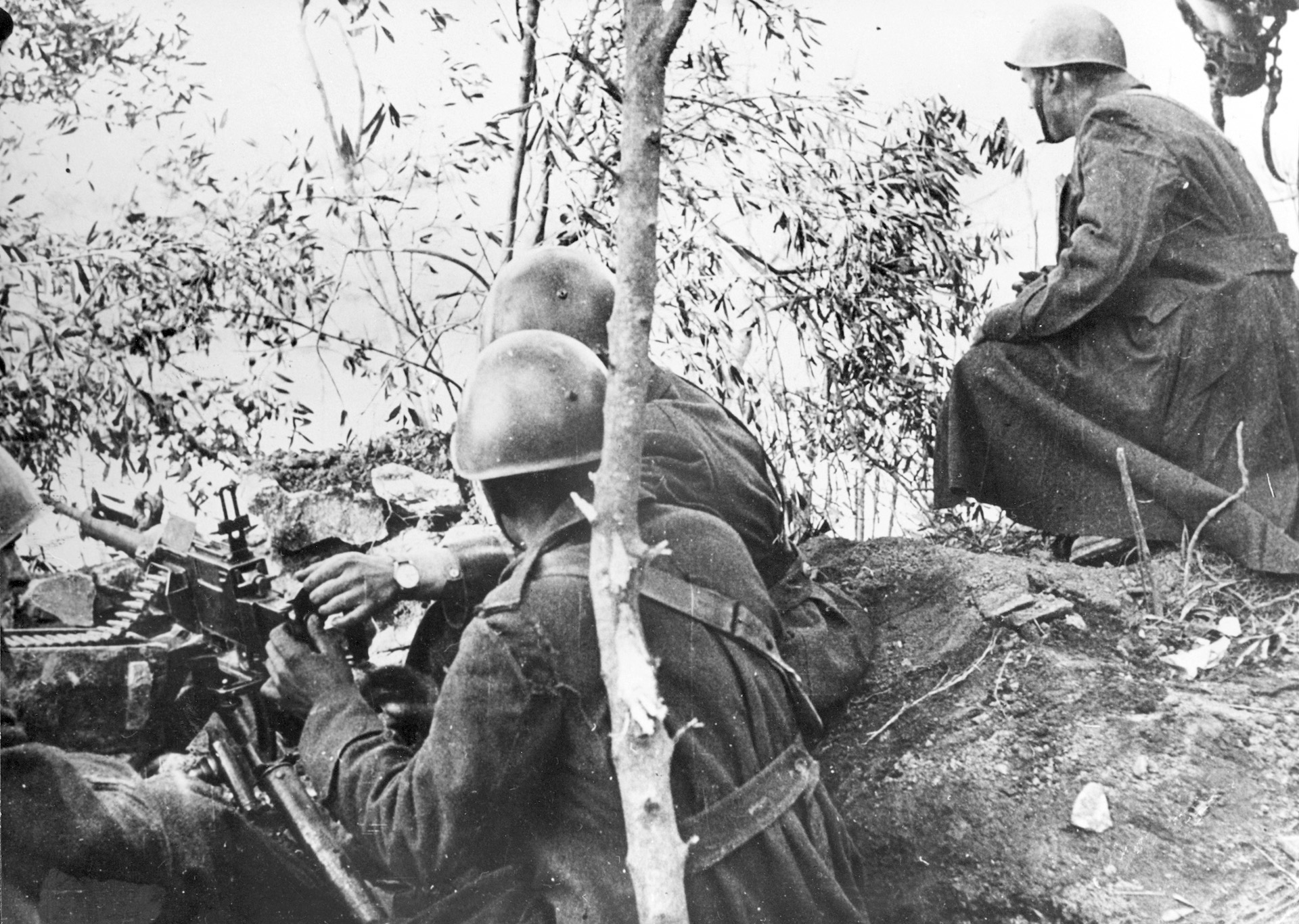Italian soldiers man a machine gun on the Albanian frontier with Greece in February 1941.