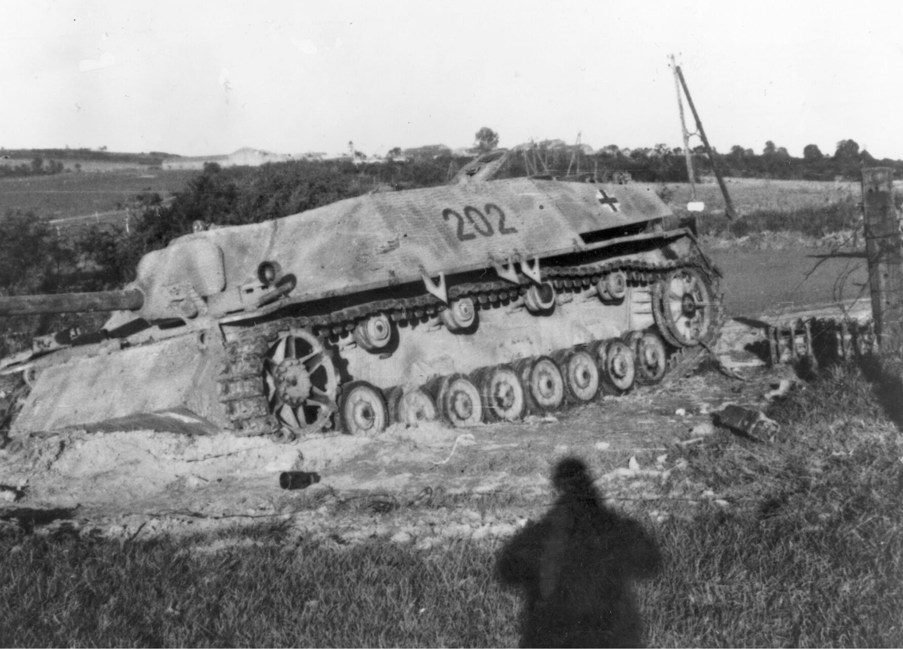 Patton spent his birthday, November 11, 1944, “getting where the dead were still warm.” He enjoyed his day by snapping a photograph of a recently captured German Stu. Gesch. 111 self-propelled gun. Patton’s shadow can be seen in the picture.