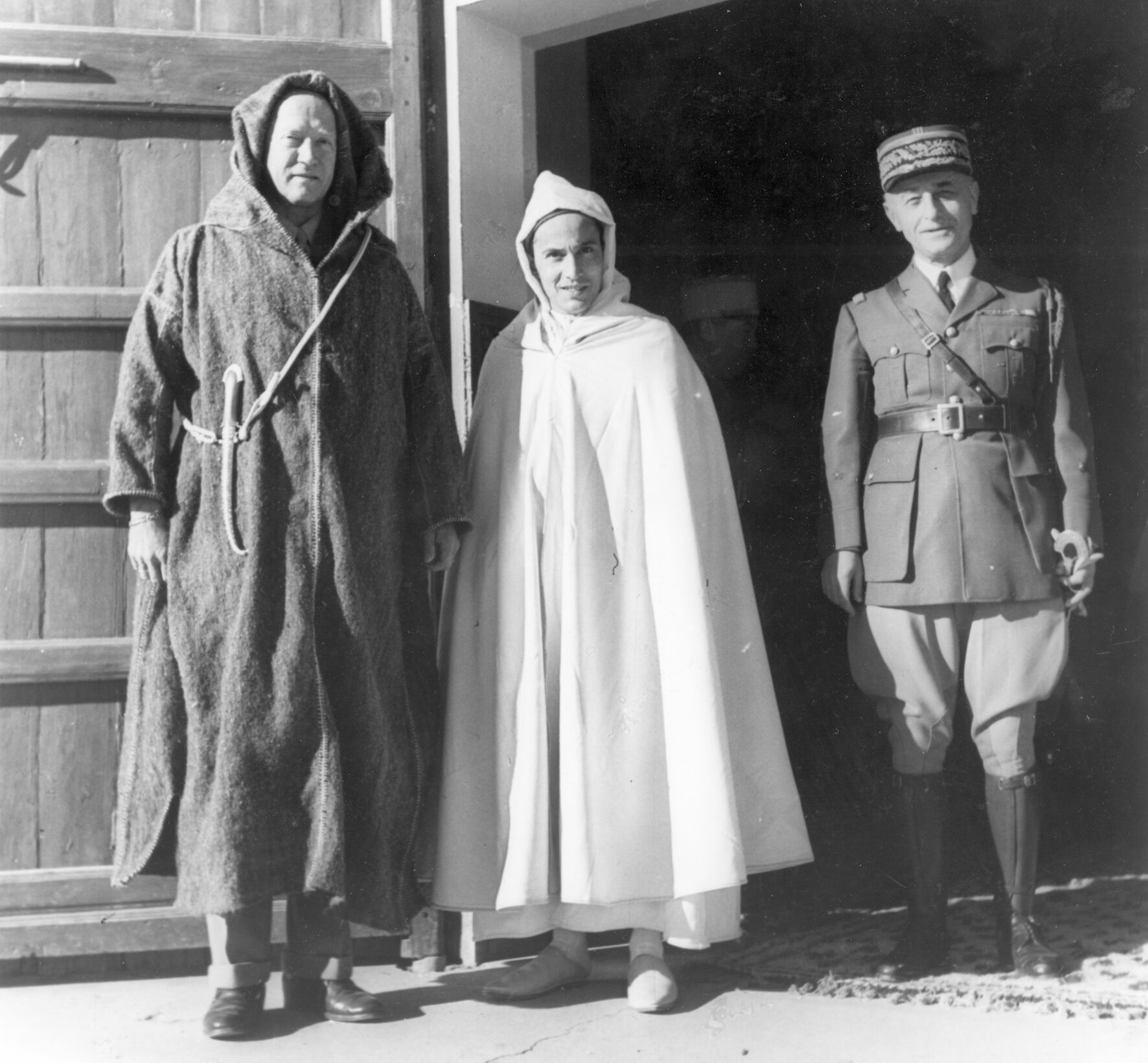 Patton, dressed in African robes with a solid gold scabbard, poses with the Pasha of Morocco and General A.P.C. Nogues, the French commander in Morocco. “This is a great country for photography,” he wrote Beatrice, “as everything is queer. You meet camels, burros, horses, and Arabs on the same road with tanks and self-propelled artillery.”
