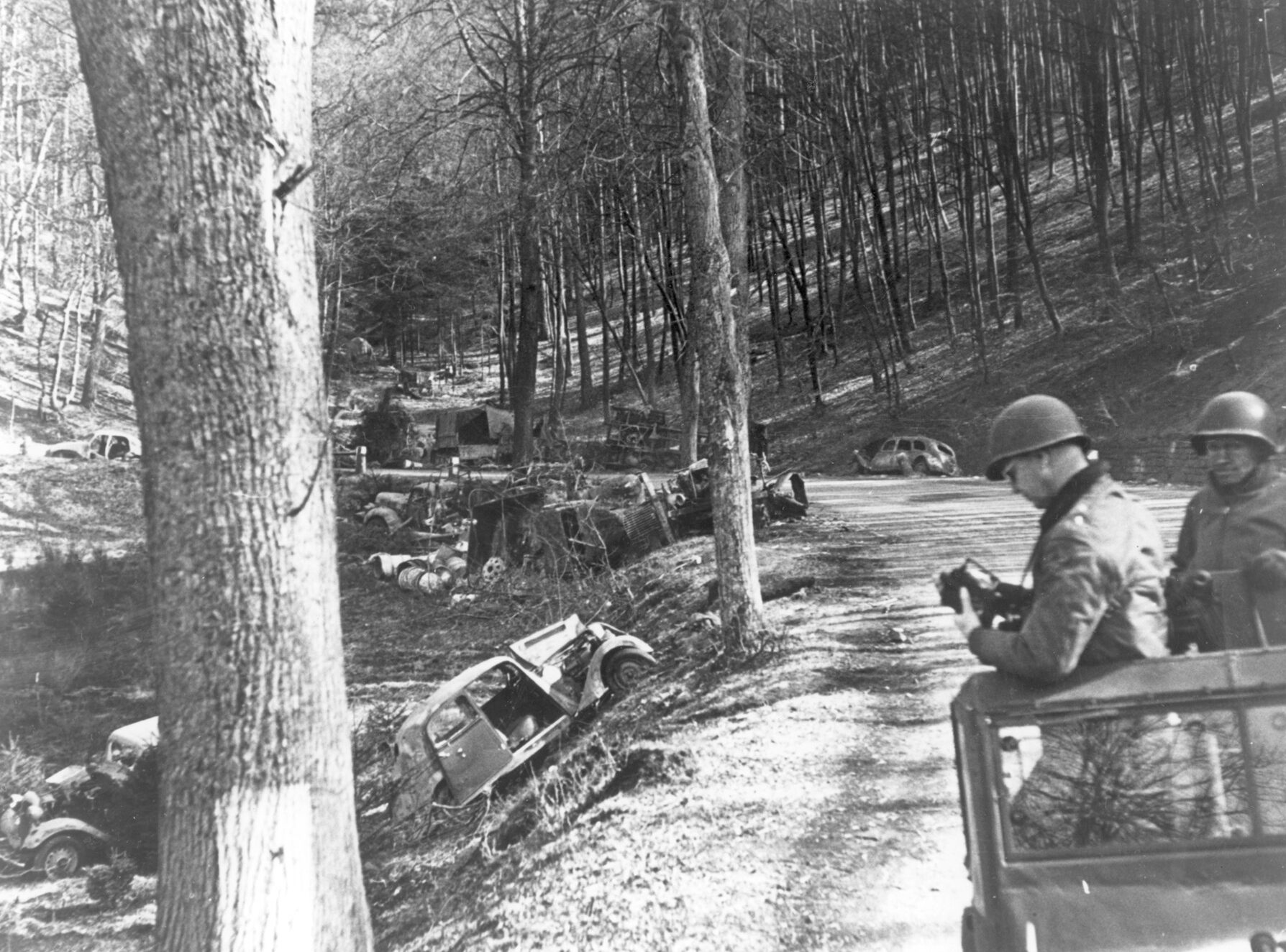 On the way into Germany, Patton photographed the awesome power of the American Air Forces. Near the town of Neustadt, he saw “one of the greatest scenes of destruction I have ever encountered.” American fighters had strafed a retreating German column. Wrecked German vehicles and dead horses littered the road for two miles. Patton took photo after photo as his command car drove through the devastation.