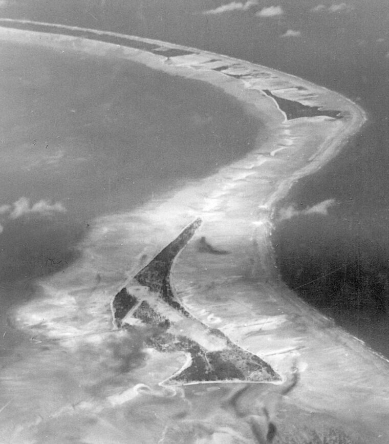 This aerial view of Betio from the west reveals the treacherous reefs that stretched several hundred yards offshore. The lagoon before Red Beach 1 and the long pier separating Red Beaches 2 and 3 are clearly visible. 