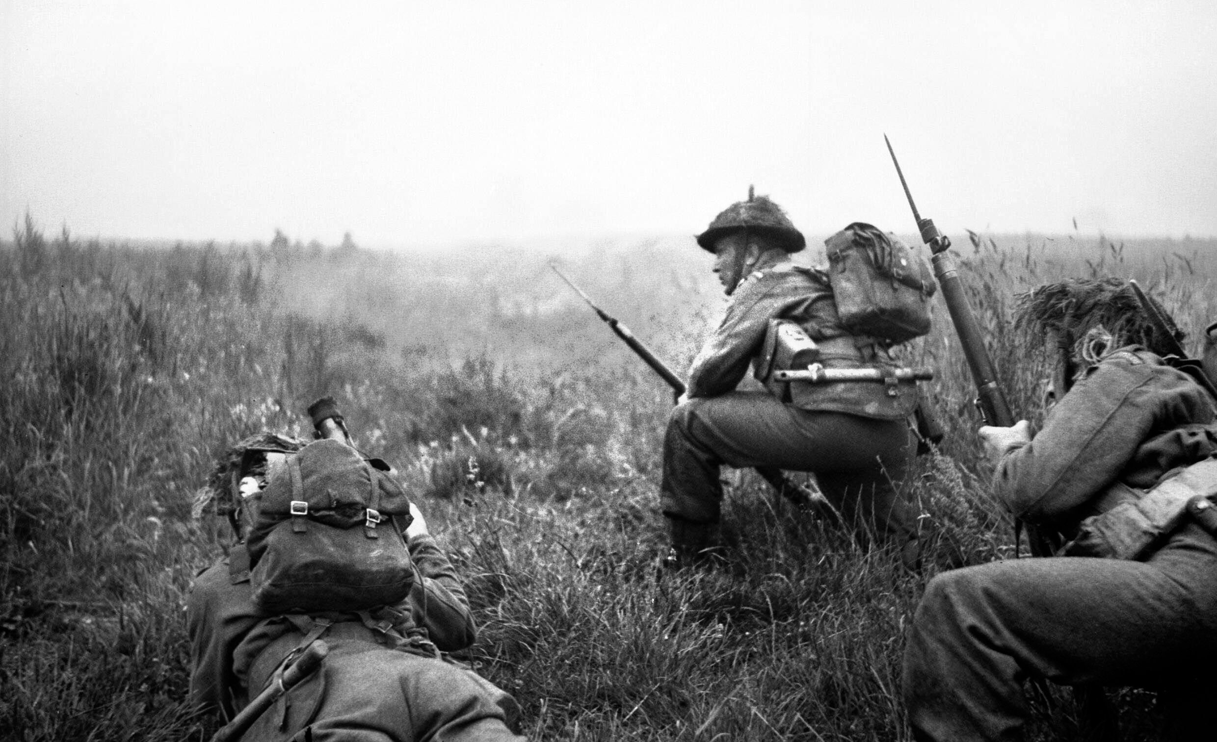 Soldiers of the 6th Royal Scots Fusiliers prepare to move forward during Operation Epsom, one of Field Marshal Montgomery's attempts to capture Caen, on June 26, 1944.