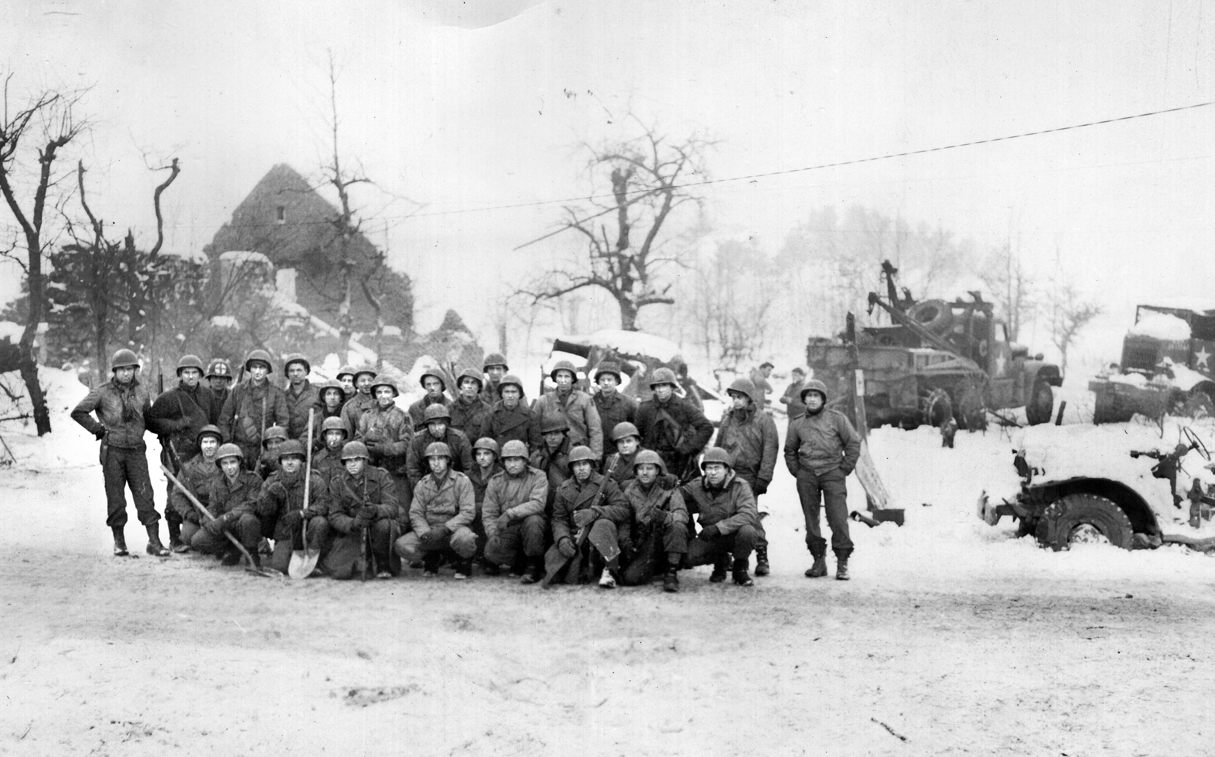 Elements of Lieutenant Colonel David E. Pergrin’s 291st Engineer Combat Battalion were located in Malmedy when Kampfgruppe Peiper passed through and massacred 84 American prisoners of war at the nearby Baugnez crossroads.  Among the first Americans to discover evidence of the war crime were engineers of C Company pictured in this photo.