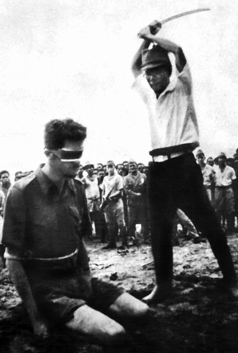Infamous photo of the execution of Australian Army coastwatcher Leonard Siffleet by Japanese naval officer Yasuno Chikao. Siffleet was one of 22 prisoners tortured and executed on Betio in October, 1942.