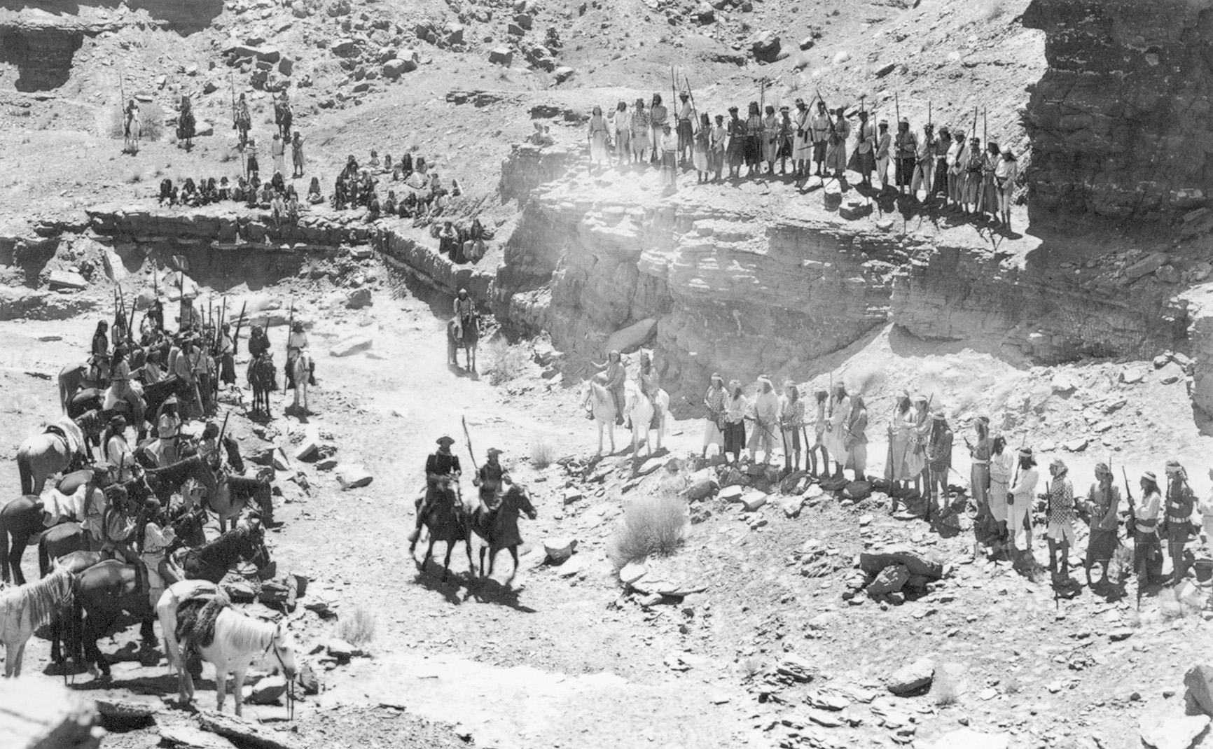 Captain York (John Wayne) negotiates a truce with the Apache in Fort Apache. 