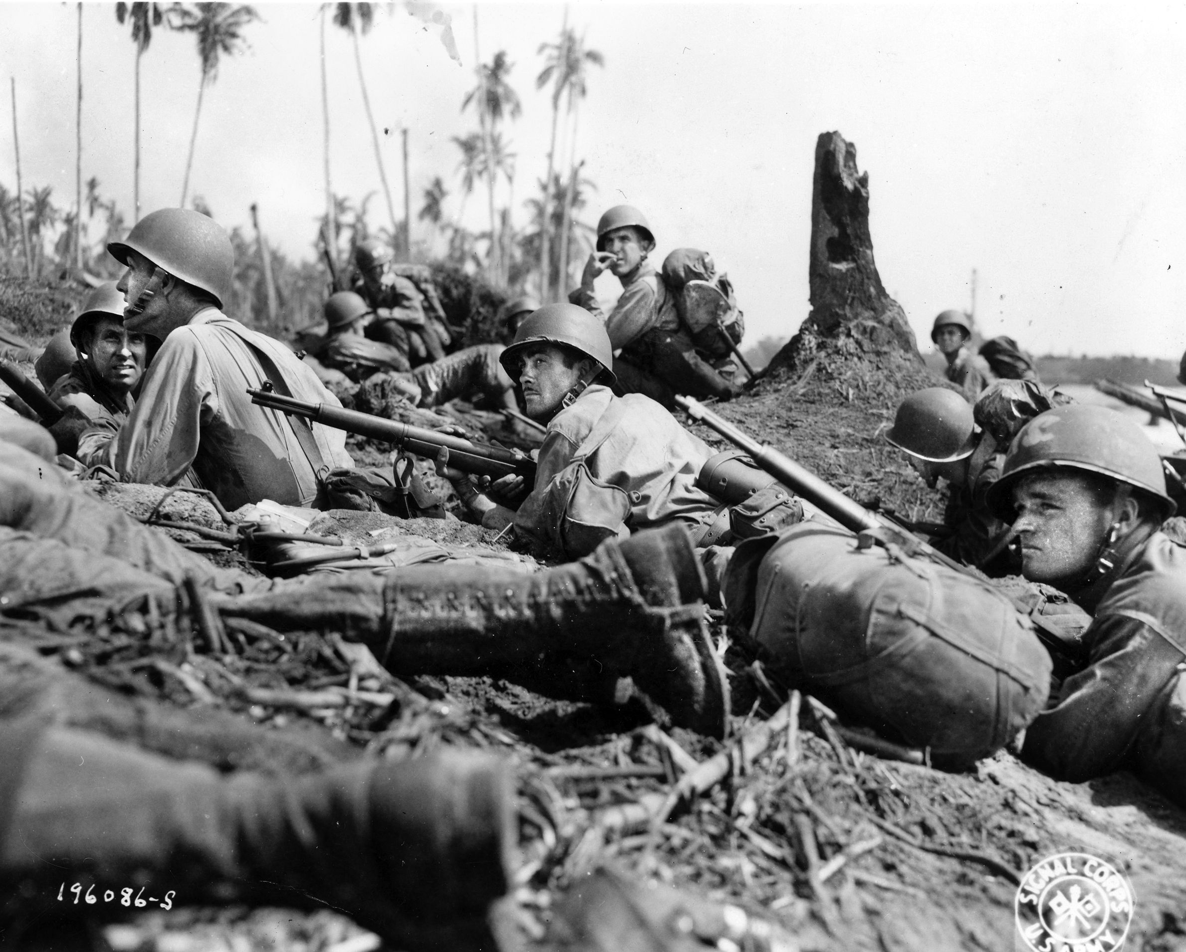 American GIs pinned down on the beach at Leyte Island. Troops of the XXIV Corps, the Seventh Infantry Division and the 96th Infantry Division were landed in amphibious tractors designed for crossing coral reefs—the vehicles had been prepped for the cancelled invasion of Yap Island. Providing cover for the landing troops, these proved so successful that they were used on beaches again in January 1945, at the Invasion of Lingayen Gulf.