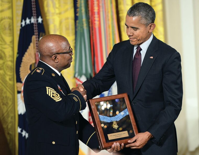 Command Sergeant Major Louis Wilson of the New York National Guard receives the Medal of Honor from President Obama on behalf of Henry Johnson—98 years after the end of World War I.