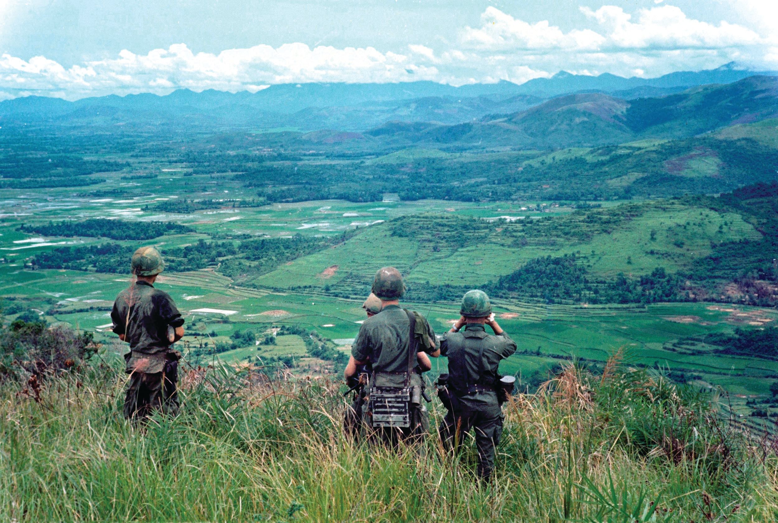 As part of Operation Wheeler, soldiers from Company “C,” 2nd Battalion, 327th Infantry, 101st Airborne Brigade, search for enemy activity and targets from their observation post in the mountainous Tam Ky area of the Republic of Vietnam.