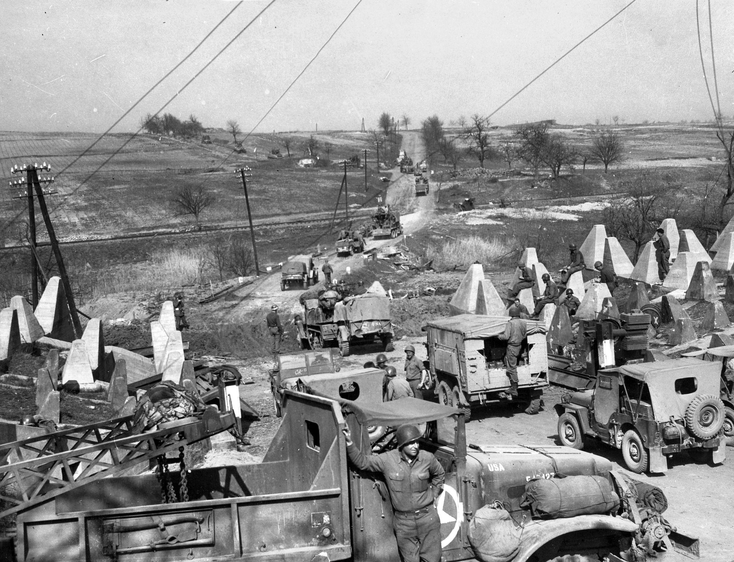 American troops easily breached the “dragon’s teeth” antitank barriers of the Siegfried Line, Germany’s last man-made line of defense. Wolf passed through the line on his way to the Germany city of Cologne.