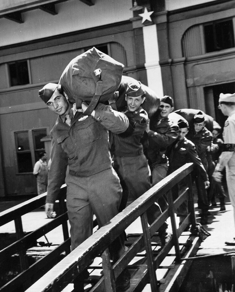 Soldiers of the 86th Infantry Division leave the troop transport that brought them home from Europe before being shuttled to Camp Kilmer, New Jersey, on June 19, 1945. Wolf visited his mother and new stepfather in New York before reporting to Camp Gruber, Oklahoma. 