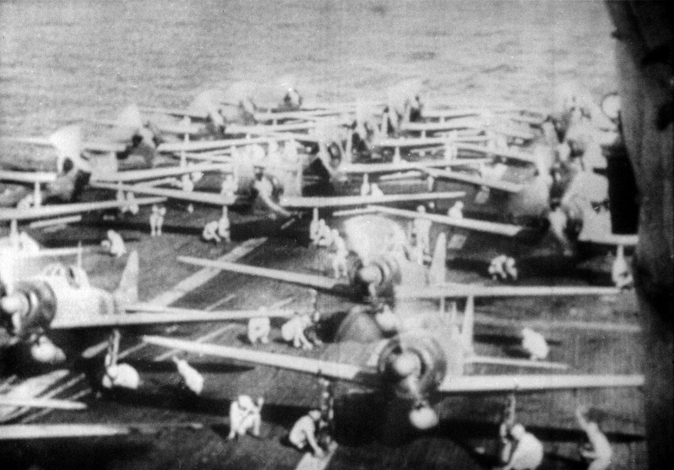 Japanese aircraft prepare for takeoff from the aircraft carrier Akagi during operations in the Indian Ocean early in the Pacific War. In the foreground are Mitsubishi A6M “Zero” fighters, with Aichi D3A “Val” dive bombers further aft. 