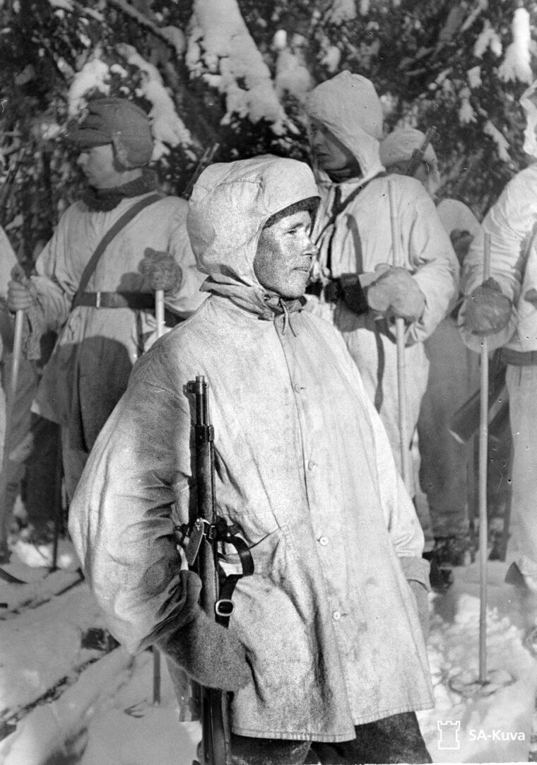 Simo Häyhä, pictured early in the Winter War, with his rifle at his side. One of the deadliest snipers in military  history, Häyhä was credited with killing 505 Soviet soldiers in 100 days.