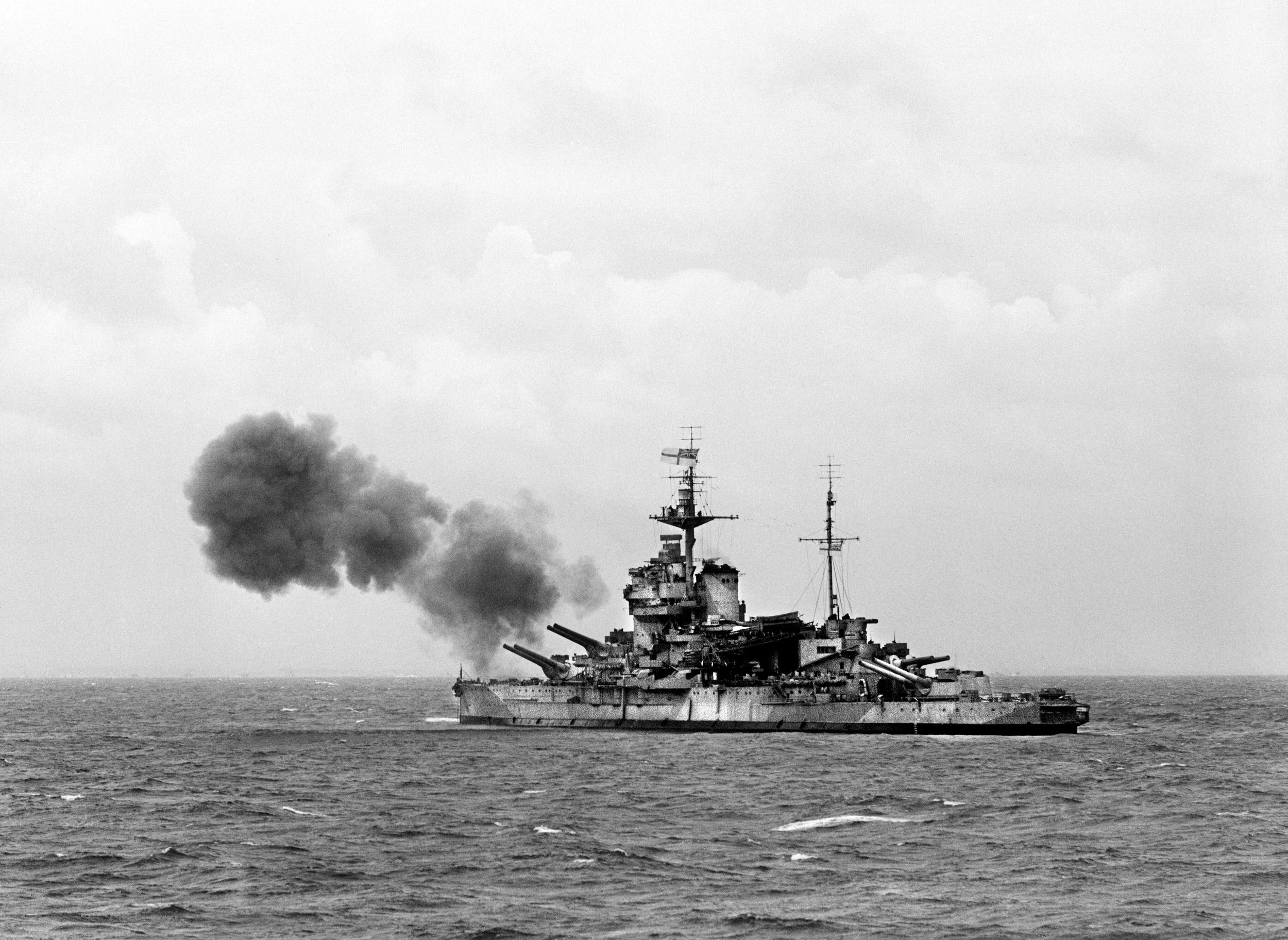 As part of Bombardment Force D, Warspite’s 15-inch guns fire at German targets at the British beaches at Normandy, June 6, 1944. With the end of the battleship era, Warspite was decommissioned and broken up after the war.