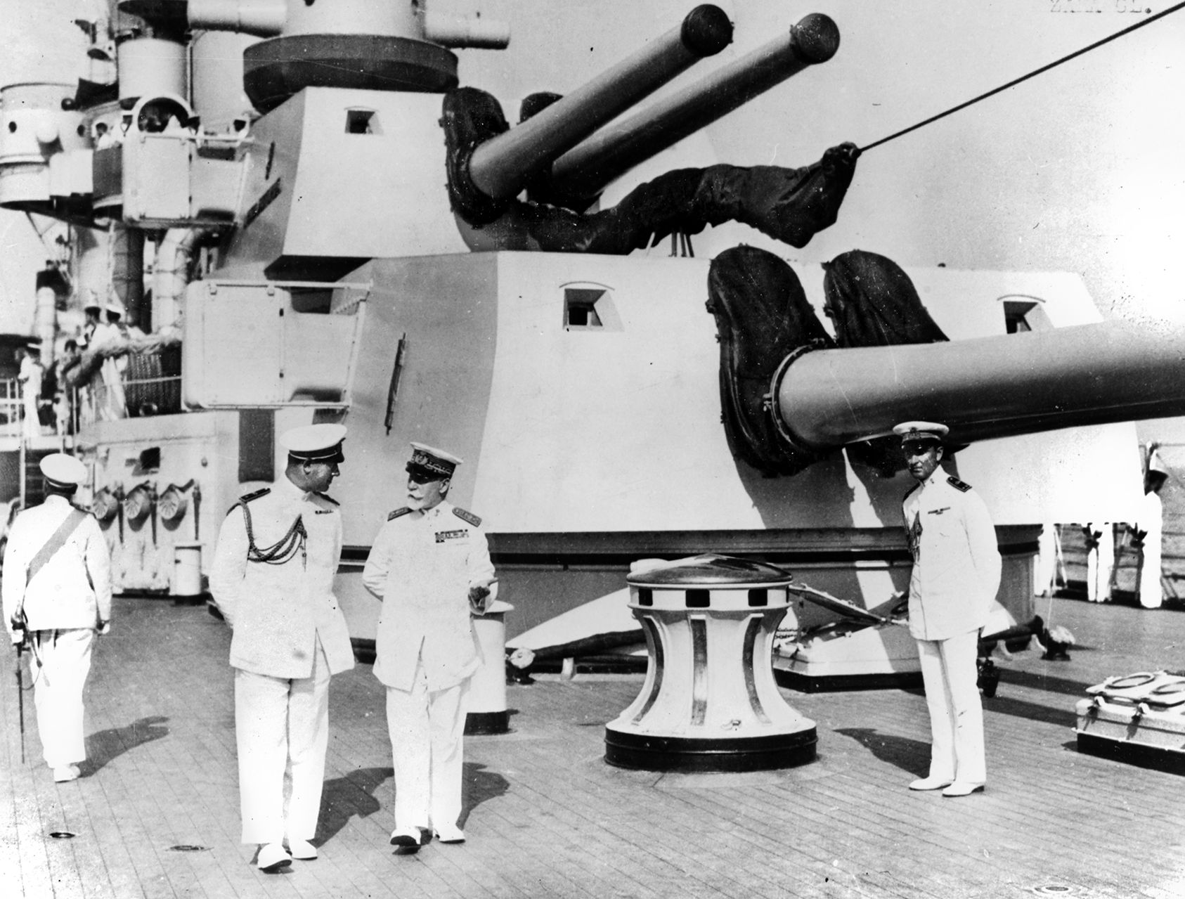 The Italian Royal Navy was one of the largest and most modern, but avoided combat. Here, Italian officers stroll the deck of the heavy cruiser Pola. The ship, along with several of her sister cruisers, was sunk by Warspite during a night attack at Cape Matapan, March 28, 1942. 