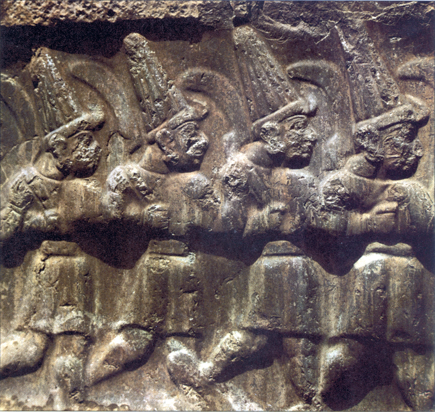 A stone panel of the so-called Running Gods, located near Hattusa, shows minor Hittite deities in full battle dress, armed with khopesh, a type of sickle-sword.