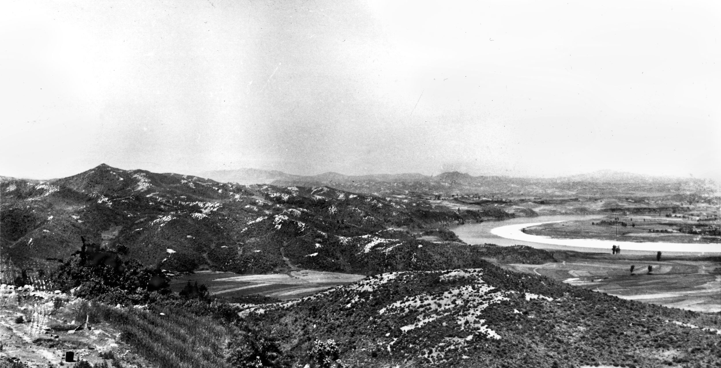 A view of the bend in the Imjin River, with Company A’s position on Hill 148, also called “Castle Hill” for the ancient ruins near its crest, at the far left. A battalion of the Chinese 559th Regiment (187th Division) forded the river and crossed on a submerged bridge, attacking Company A on the morning of April 23, 1951. Outnumbered at least six to one, Glosters’ A Company held on until late that evening when, at less than half strength and all officers killed or wounded, they fell back to Hill 235.