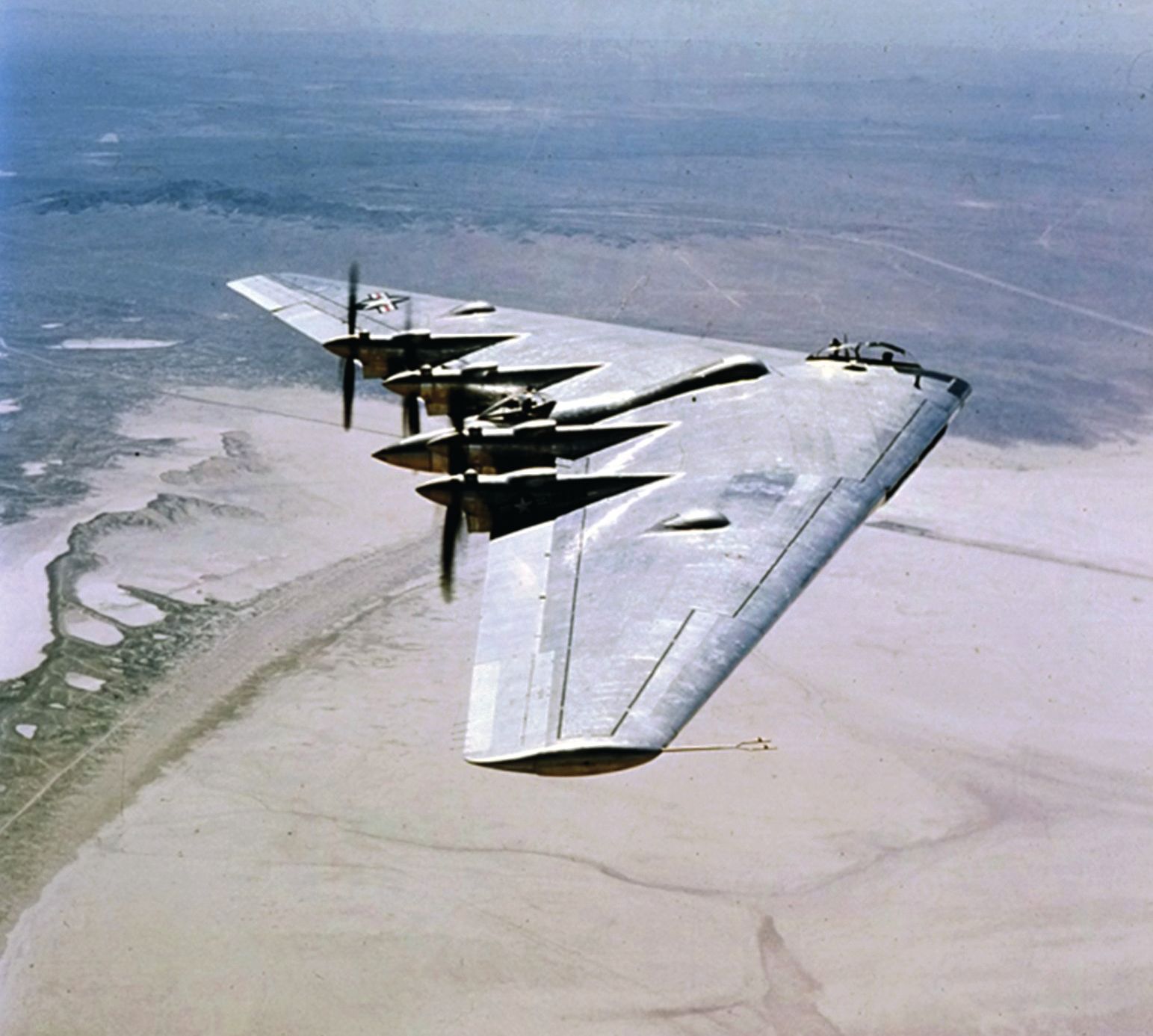 In 1942 Northrop began work on the XB-35/YB-35, a propeller-driven heavy bomber. The plane, shown here in a 1947 test flight, would have had a crew of nine.