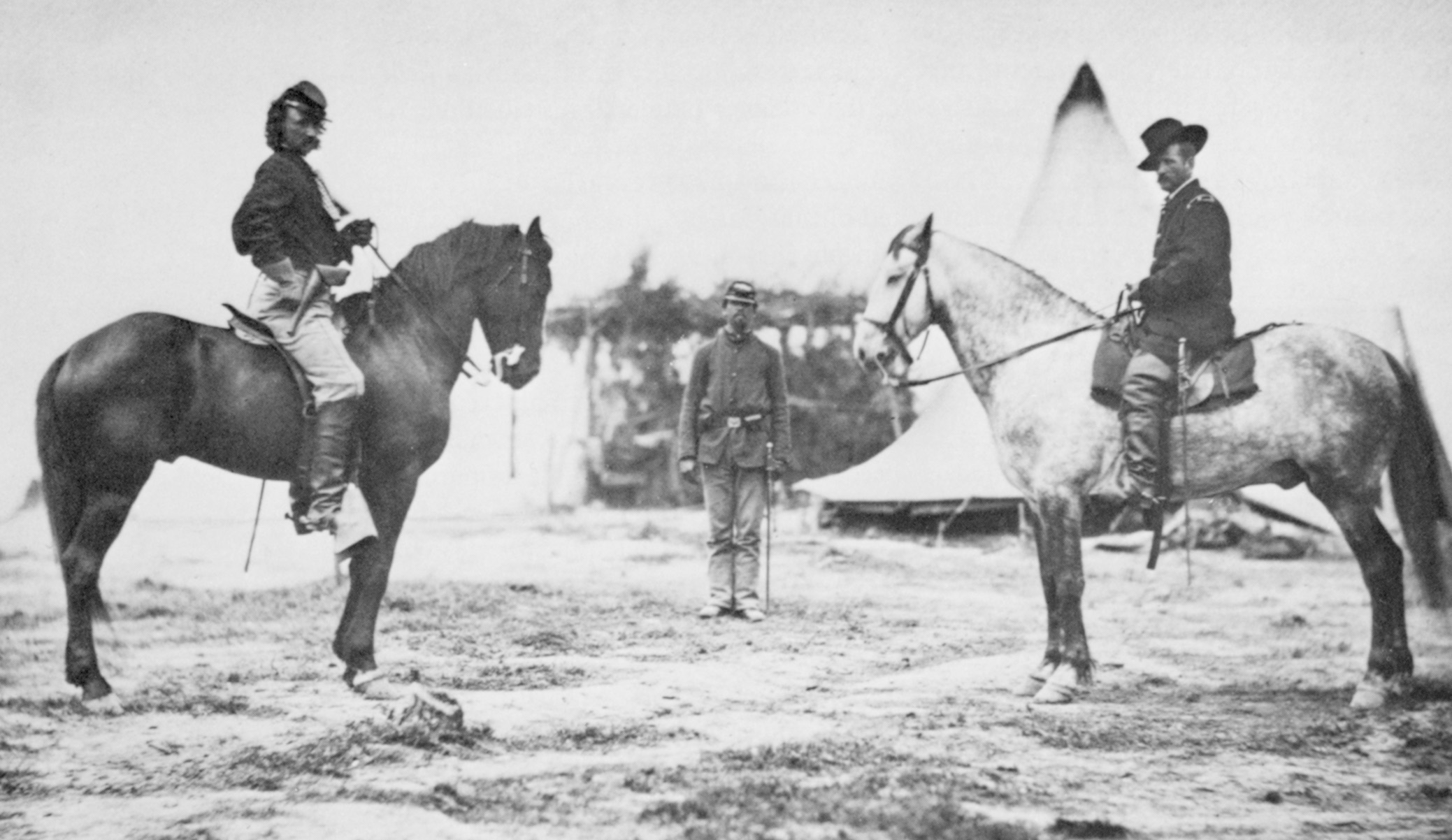 Brigadier General George Armstrong Custer confers with Maj. Gen. Alfred Pleasonton. Pleasonton, the Union Cavalry Corps commander preferred to stay in his headquarters instead of in the field.